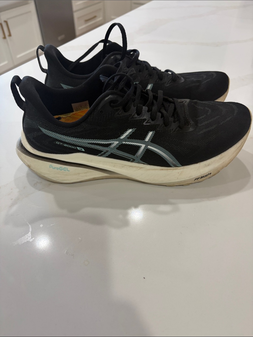 ASICS Black Women’s Running Shoes with Light Blue Accents